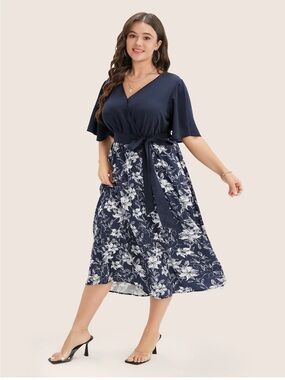BloomChic Plus Size Floral Patchwork Pocket Belt Surplice Neck Ruffle Hem Dress